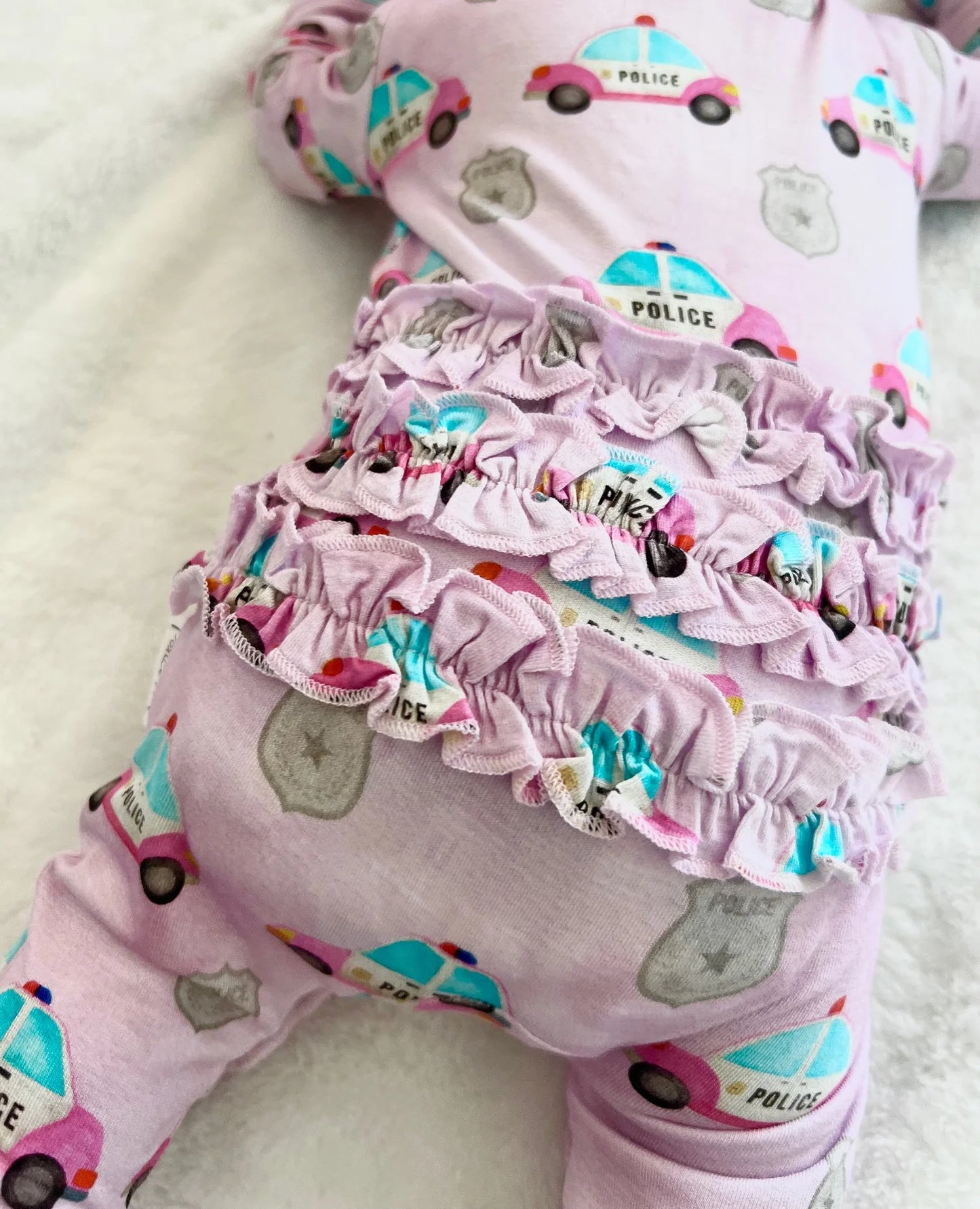"Pink Police Cars and Badges" Comfy Cozies Ruffle Zip-Up Footie