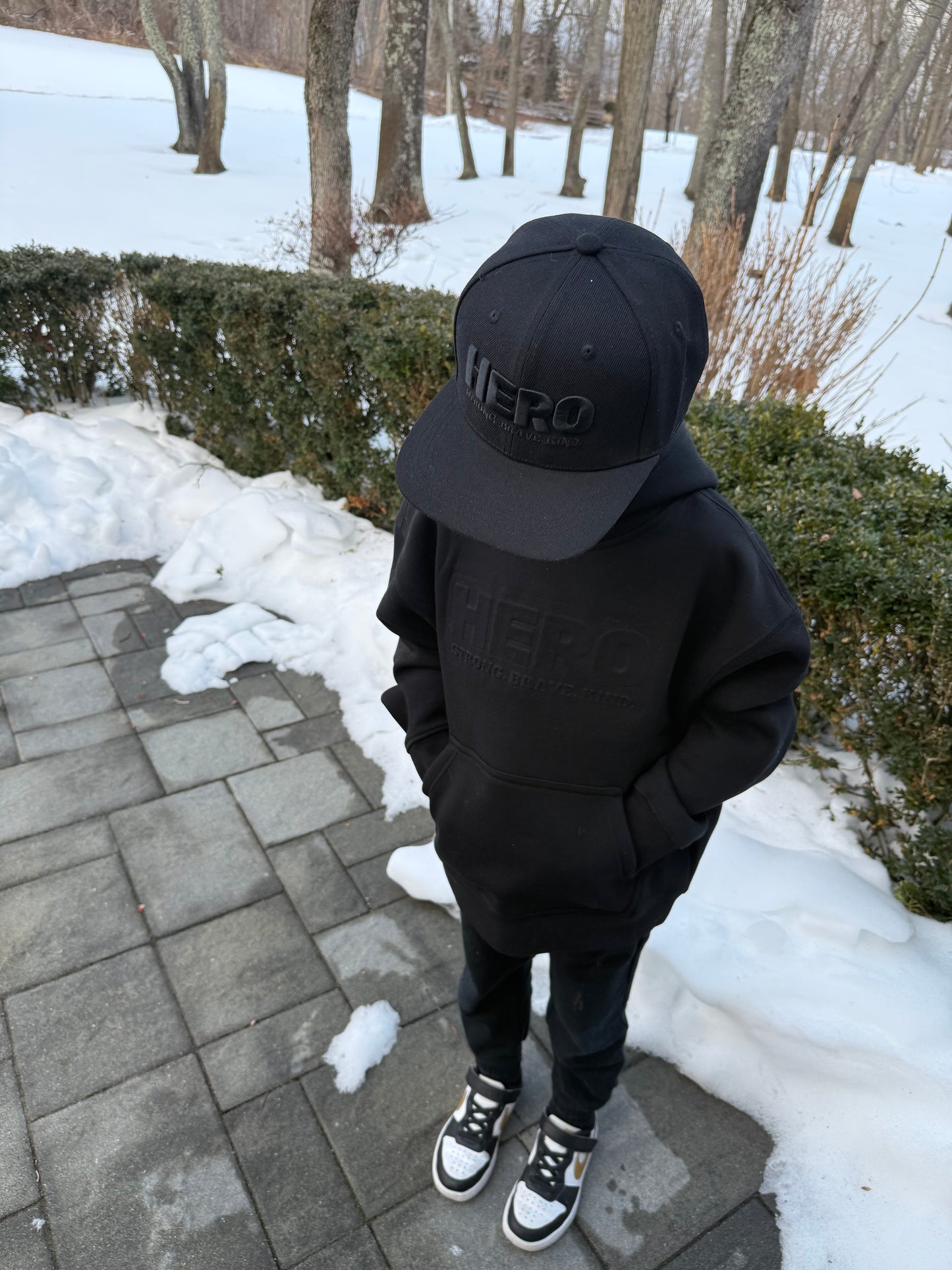 “Raised to be a Hero” Premium Embossed Hoodie