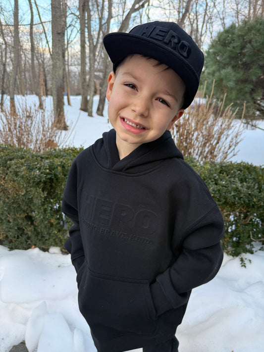 “Raised to be a Hero” Premium Embossed Hoodie